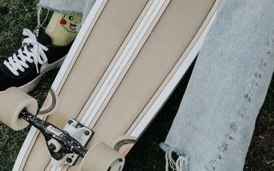 Close-up of athletic shoes on a stable surface.