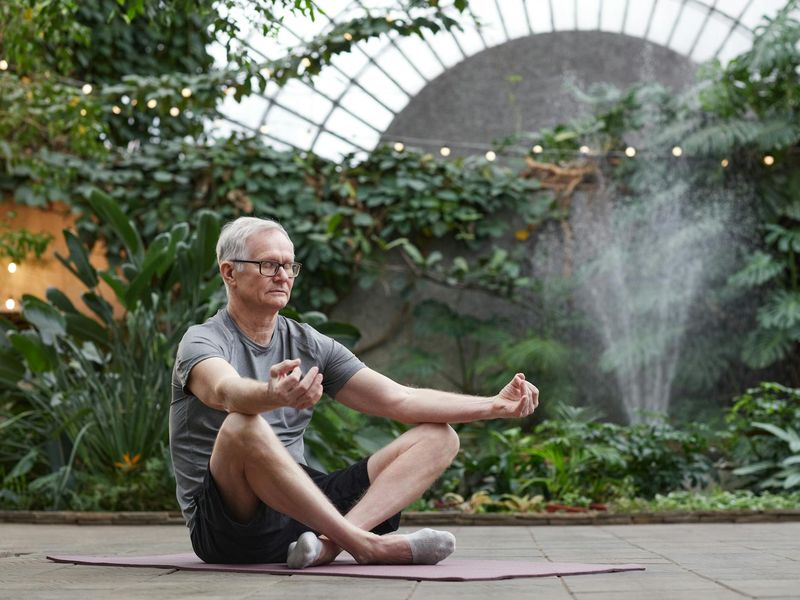 Man focusing before a workout session in a calm environment.