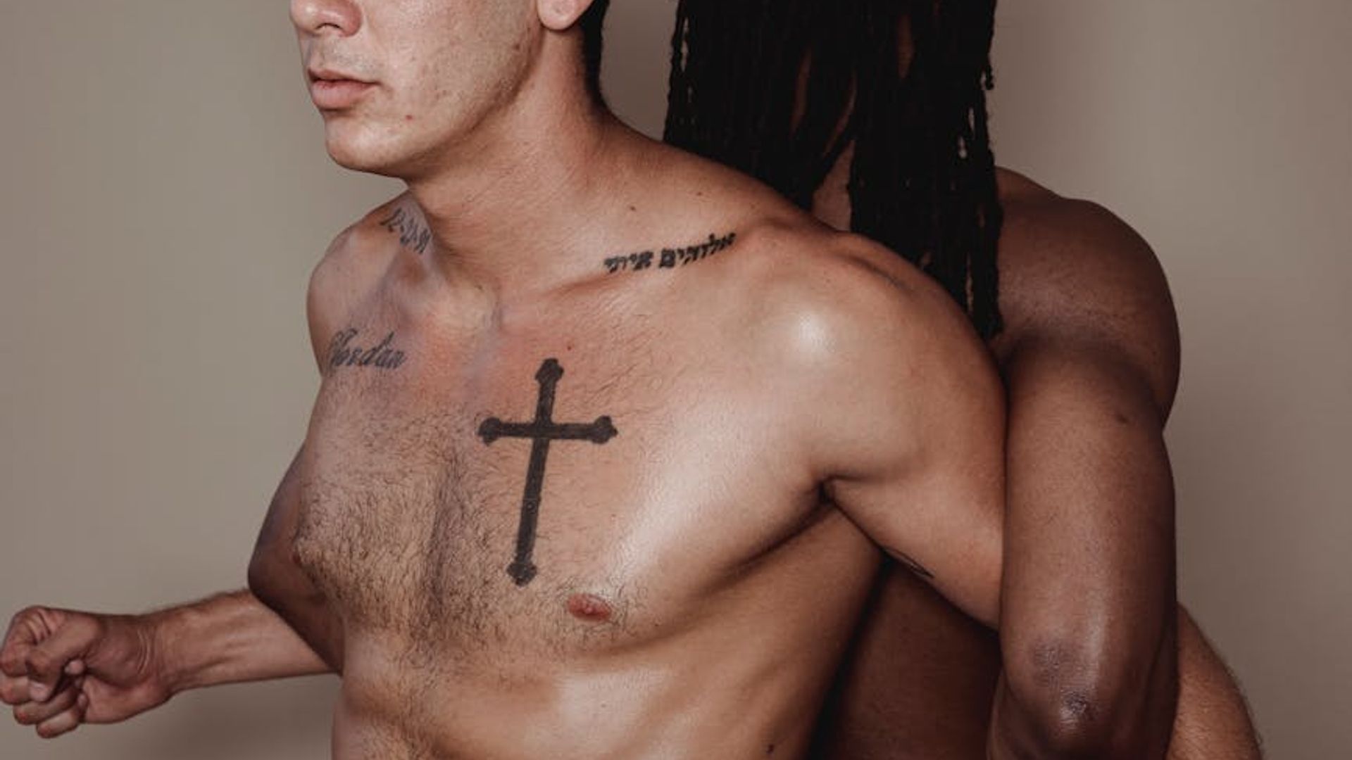 Man performing a controlled strength exercise in a minimalist gym.